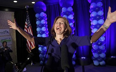 Congressional candidate Kim Schrier addresses the crowd at an election night party for Democrats Tuesday, Nov. 6, 2018, in Bellevue, Wash. (AP Photo/Elaine Thompson)