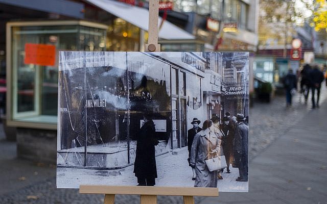 A November 10, 1938 photo from the AP Archive, showing Nazis destroyed Jewish shops at the Kurfuerstendamm street, is placed at the same location 80 years later in Berlin, Germany, Tuesday, Nov. 6, 2018. (Markus Schreiber/AP) A November 10, 1938 photo from the AP Archive, showing Nazis destroyed Jewish shops at the Kurfuerstendamm street, is placed at the same location 80 years later in Berlin, Germany, Tuesday, Nov. 6, 2018. (Markus Schreiber/AP)