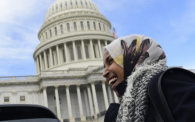 Rep.-elect Ilhan Omar, D-Minn., smiles during an interview following a photo opportunity on Capitol Hill in Washington, Wednesday, Nov. 14, 2018, with the freshman class. (AP/Susan Walsh) Rep.-elect Ilhan Omar, D-Minn., smiles during an interview following a photo opportunity on Capitol Hill in Washington, Wednesday, Nov. 14, 2018, with the freshman class. (AP/Susan Walsh)