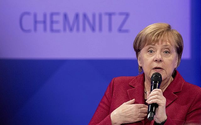 German Chancellor Angela Merkel attends a discussion with citizen at the East German city Chemnitz, Friday, Nov. 16, 2018. (AP Photo/Kay Nietfeld, Pool) German Chancellor Angela Merkel attends a discussion with citizen at the East German city Chemnitz, Friday, Nov. 16, 2018. (AP Photo/Kay Nietfeld, Pool)