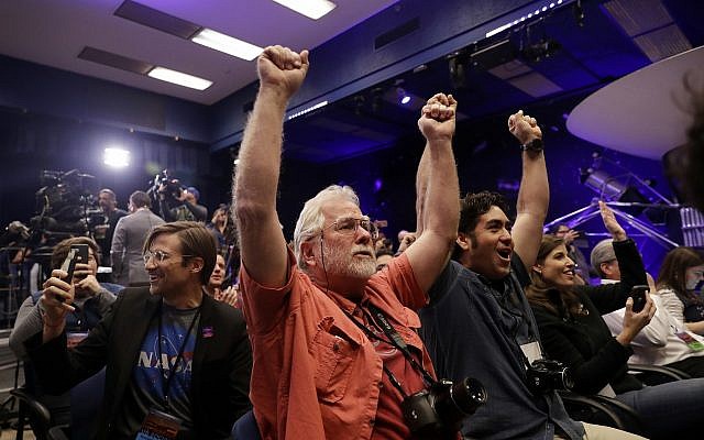 People at NASA's Jet Propulsion Laboratory in Pasadena, California, celebrate as the InSight lander touches down on Mars on November 26, 2018. (AP Photo/Marcio Jose Sanchez) People at NASA's Jet Propulsion Laboratory in Pasadena, California, celebrate as the InSight lander touches down on Mars on November 26, 2018. (AP Photo/Marcio Jose Sanchez)