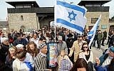Members of a delegation from Israel arrive for a ceremony to commemorate the 70th anniversary of the liberation of the Nazi concentration camp in Mauthausen, Austria, Sunday, May 10, 2015. (AP Photo/Ronald Zak)