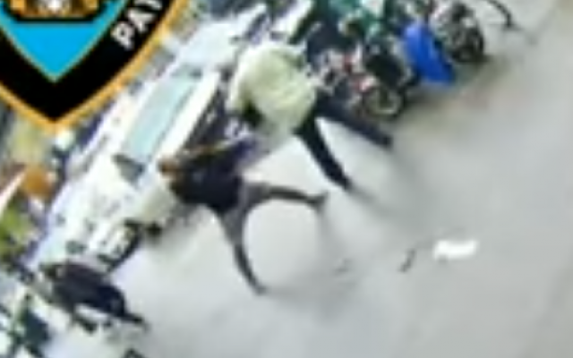 A screen capture from surveillance video released by the New York Police Department showing an alleged anti-Semitic attack in the borough of Brooklyn. (Screen capture: YouTube) A screen capture from surveillance video released by the New York Police Department showing an alleged anti-Semitic attack in the borough of Brooklyn. (Screen capture: YouTube)