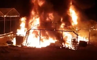A greenhouse that was set on fire by an infiltrator from Gaza on November 9, 2018. (screen capture)