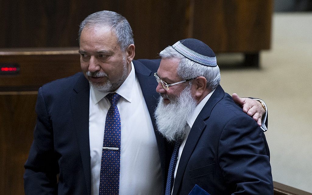 Eli Ben-Dahan of the Jewish Party and Yisrael Beytenu leader Avigdor Lieberman at the Knesset on June 1, 2016. (Yonatan Sindel/Flash90)