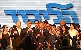 Prime Minister Benjamin Netanyahu (C) takes part in a toast with his wife and Likud lawmakers during an event in Tel Aviv held by the ruling party to mark the Jewish new year's, on September 6, 2018. (Gili Yaari/Flash90)