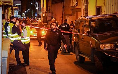 Police and medical personnel outside the home of Sylvana Tsegai, after she was found dead on November 26, 2018. (Flash90)