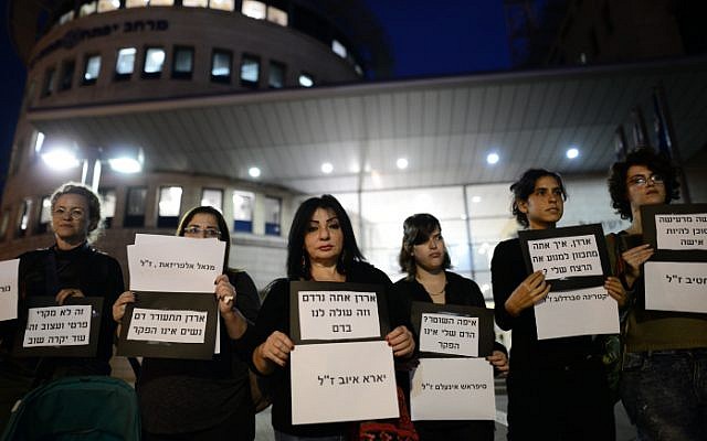 Women attend a rally protesting violence against women, following the murders of two young women, outside police headquarters in south Tel Aviv on November 28, 2018. (Tomer Neuberg/Flash90) Women attend a rally protesting violence against women, following the murders of two young women, outside police headquarters in south Tel Aviv on November 28, 2018. (Tomer Neuberg/Flash90)
