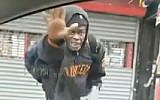 Screen capture from video of a man giving the Nazi salute and shouting 'Heil Hitler' at a Jewish car driver in Brooklyn , New York, November 15, 2018. (YouTube)