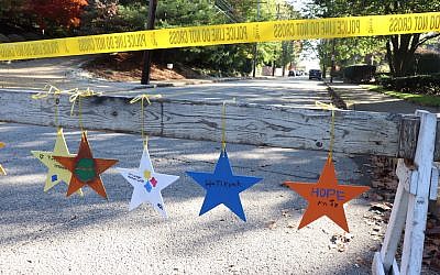 Stars hanging in the Squirrel Hill neighborhood of Pittsburgh painted by children from a Manhattan synagogue as part of the Stars of Hope initiative. (Hane Grace Yagel via JTA)