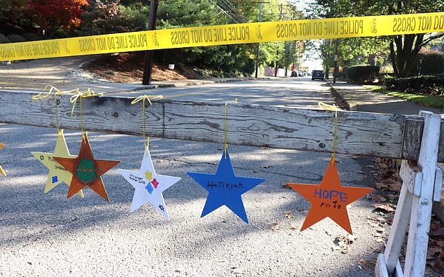 Stars hanging in the Squirrel Hill neighborhood of Pittsburgh painted by children from a Manhattan synagogue as part of the Stars of Hope initiative. (Hane Grace Yagel via JTA) Stars hanging in the Squirrel Hill neighborhood of Pittsburgh painted by children from a Manhattan synagogue as part of the Stars of Hope initiative. (Hane Grace Yagel via JTA)