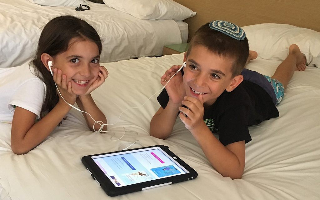 Children listening to books published by the Israel Audiobook Project (Courtesy)