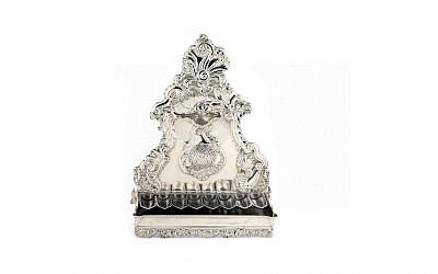 Despite its humble appearance, The Amsterdam Jewish Historical Museum’s Nieuwenhuys menorah is worth more than many of the city’s houses. (Courtesy of the the Amsterdam Jewish Historical Museum/via JTA)