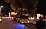 Burning tires are seen on Route 34 at the entrance to the southern Israeli town of Sderot on November 14, 2018, during a protest over the government's handling of violence from the Gaza Strip. (Israel Police)