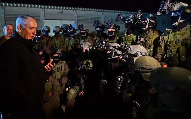 Prime Minister Benjamin Netanyahu, left, meeting with soldiers from the IDF's Commando Brigade, on November 27, 2018. (Kobi Gideon/GPO) Prime Minister Benjamin Netanyahu, left, meeting with soldiers from the IDF's Commando Brigade, on November 27, 2018. (Kobi Gideon/GPO)
