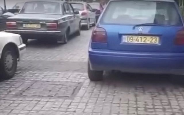 A screen capture from video footage reportedly filmed in Amman, Jordan, shows cars with Israeli license plates being used in the production of a Netflix project based in Tel Aviv. (Screen capture: YouTube) A screen capture from video footage reportedly filmed in Amman, Jordan, shows cars with Israeli license plates being used in the production of a Netflix project based in Tel Aviv. (Screen capture: YouTube)