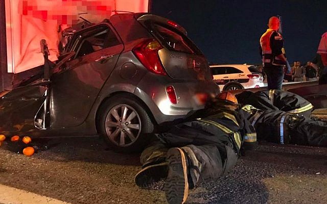 Firefighters work to free trapped passengers following crash on Route 6 on November 20, 2018. (Fire and Rescue Service) Firefighters work to free trapped passengers following crash on Route 6 on November 20, 2018. (Fire and Rescue Service)
