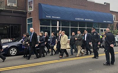 Mourners walking at the funeral of Bernice and Sylvan Simon, Nov. 1, 2018. (Arielle Kaplan/JTA)