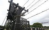 The main gate leading into the former Nazi German Stutthof concentration camp in Sztutowo, Poland, July 18, 2017. (AP Photo/Czarek Sokolowski)