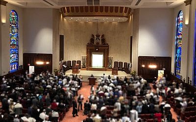 On November 3, 2018, a joint communal Shabbat prayer service at Pittsburgh's Beth Shalom Conservative synagogue following the massacre a week prior which saw 11 Jewish community members killed. (Amanda Borschel-Dan/Times of Israel)