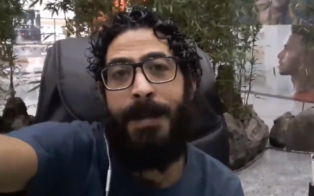 Syrian refugee Hassan al-Kontar who was stranded at a Malaysian airport for eight months after his release, in a video published on November 26, 2018. (Screen capture: Twitter) Syrian refugee Hassan al-Kontar who was stranded at a Malaysian airport for eight months after his release, in a video published on November 26, 2018. (Screen capture: Twitter)