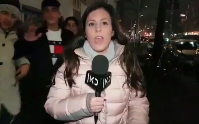 Israeli journalist Antonia Yamin reporting in Berlin, Germany, before being interrupted in a video published on November 25, 2018. (Screen capture: Twitter) Israeli journalist Antonia Yamin reporting in Berlin, Germany, before being interrupted in a video published on November 25, 2018. (Screen capture: Twitter)