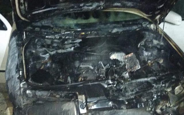 A vehicle torched in an apparent hate crime in the northern West Bank Palestinian village of Urif on November 14, 2018. (Israel Police) A vehicle torched in an apparent hate crime in the northern West Bank Palestinian village of Urif on November 14, 2018. (Israel Police)