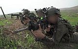Soldiers from the IDF Commando Brigade simulate fighting the Hezbollah terror group,  in northern Israel, in November 2018. (Israel Defense Forces)
