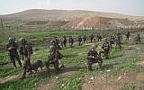 Illustrative: Soldiers from the IDF Commando Brigade take part in a large-scale training exercise in November 2018. (Israel Defense Forces)