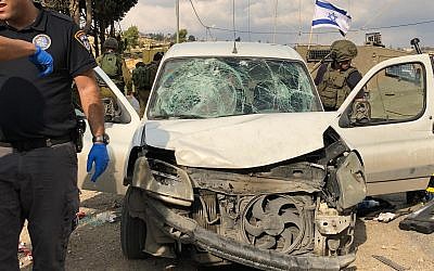 Emergency response personnel respond to an apparent car-ramming attack in which three IDF soldiers were injured in the central West Bank on November 26, 2018. (Israel Defense Forces)