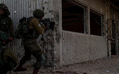 Soldiers from the Kfir Infantry Brigade simulate war against the Hamas terror group in the Gaza Strip, in November 2018. (Israel Defense Forces)