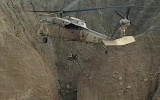 Illustrative: A military helicopter holding a 669 Search & Rescue crewman and a stranded hiker over a flooded riverbed in southern Israel, November 9, 2018. (Courtesy: IDF)