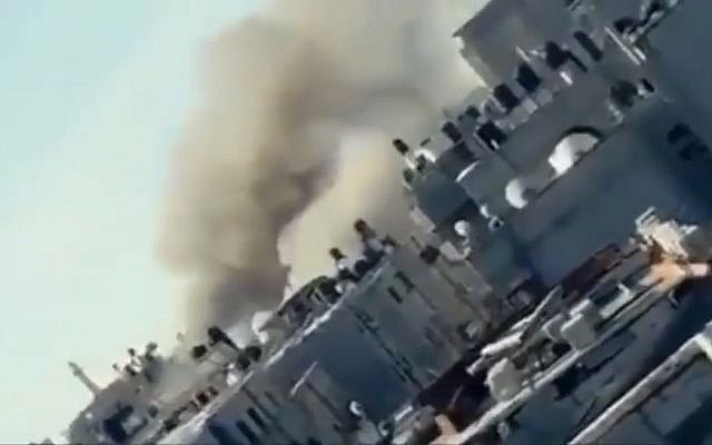 Smoke billowing above the Bureij Refugee Camp in the central Gaza Strip after the area is rocked by a series of explosions in what Hamas officials called a 'work accident,' November 28, 2018. (Twitter screen capture)