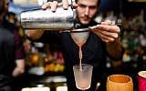 Bartenders from the Gatsby cocktail bar will be pouring drinks for Open Restaurants Jerusalem at the temporary bar of Fink's, the legendary watering hole currently on display at the Tower of David museum (Courtesy Igor Pavrov)
