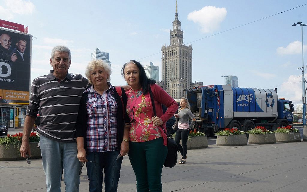 Sarah Hirsch, right, with her husband, Naftali, and friend Gabby Schwartz arriving at a Warsaw hotel, September 6, 2018. (Cnaan Liphshiz/JTA) Sarah Hirsch, right, with her husband, Naftali, and friend Gabby Schwartz arriving at a Warsaw hotel, September 6, 2018. (Cnaan Liphshiz/JTA)