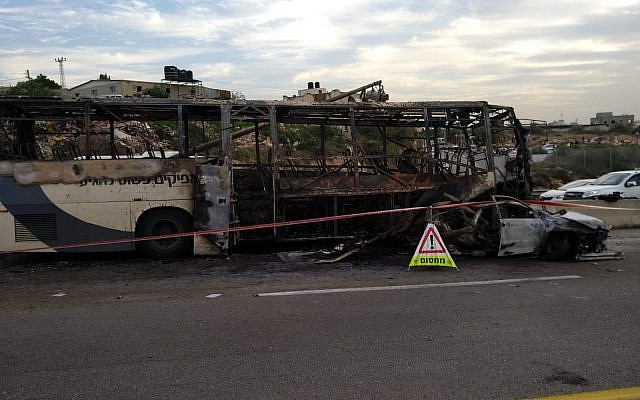 The scene of a fatal collision between a car and a bus on Route 5 in the northern West Bank on November 29, 2018. (Credit: MDA) The scene of a fatal collision between a car and a bus on Route 5 in the northern West Bank on November 29, 2018. (Credit: MDA)