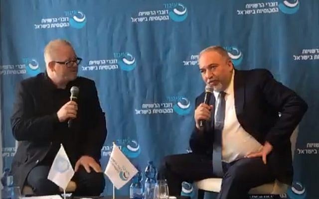 Former defense minister Avigdor Liberman right) addressing a conference in Netanya, November 22, 2018. (Screenshot) Former defense minister Avigdor Liberman right) addressing a conference in Netanya, November 22, 2018. (Screenshot)