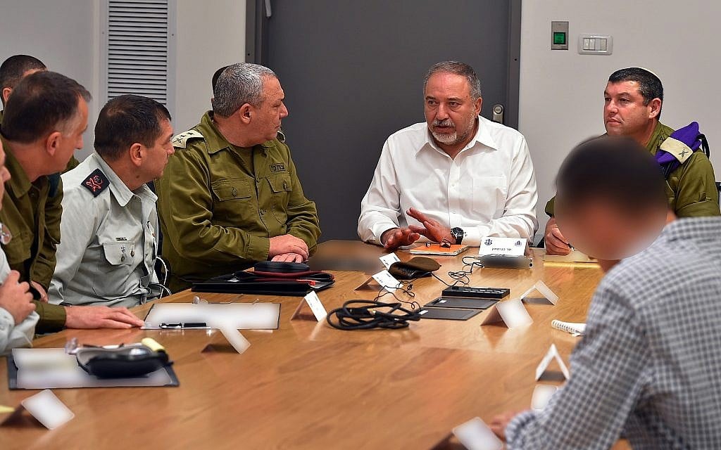 Defense Minister Avigdor Liberman meets with IDF chief Gadi Eisenkot, the head of the Shin Bet security service and other senior defense officials in the army's Tel Aviv headquarters on November 11, 2018. (Ariel Hermoni/Defense Ministry) Defense Minister Avigdor Liberman meets with IDF chief Gadi Eisenkot, the head of the Shin Bet security service and other senior defense officials in the army's Tel Aviv headquarters on November 11, 2018. (Ariel Hermoni/Defense Ministry)