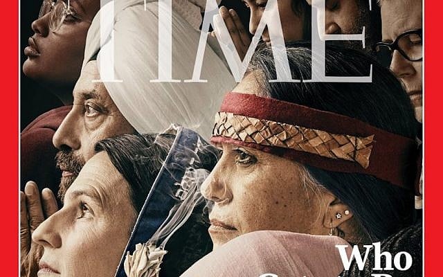 Rabbi Sharon Brous, wearing a blue tallit, can be seen on Time Magazine’s latest cover. (Time Magazine via JTA) Rabbi Sharon Brous, wearing a blue tallit, can be seen on Time Magazine’s latest cover. (Time Magazine via JTA)