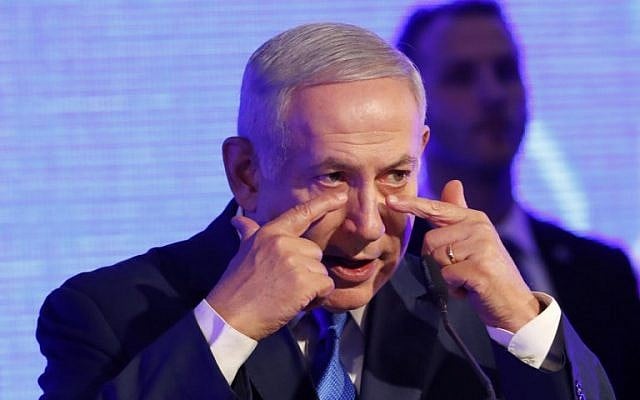 Prime Minister Benjamin Netanyahu delivers a speech before lighting a menorah during the start of Hanukkah in Ramat Gan on December 2, 2018. (Jack GUEZ / AFP) Prime Minister Benjamin Netanyahu delivers a speech before lighting a menorah during the start of Hanukkah in Ramat Gan on December 2, 2018. (Jack GUEZ / AFP)