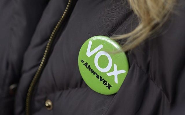 In this file photo taken on December 01, 2018 a woman wears a pin reading "Vox, now" during a demonstration called by the far-right party VOX against Catalan separatists in Madrid. (OSCAR DEL POZO / AFP) In this file photo taken on December 01, 2018 a woman wears a pin reading "Vox, now" during a demonstration called by the far-right party VOX against Catalan separatists in Madrid. (OSCAR DEL POZO / AFP)