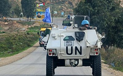 A United Nations Interim Force in Lebanon (UNIFIL) armored personnel carrier (APC) patrols along the border with Israel near the southern Lebanese village of Kfar Kila on December 4, 2018. (Mahmoud Zayyat/AFP)