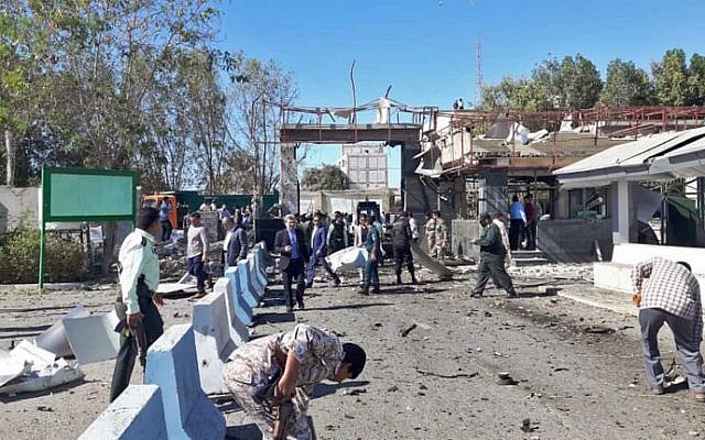 The scene of a car bombing in front of a police station in the city of Chabahar, southern Iran, on December 6, 2018. (STR/Fars News Agency/AFP) The scene of a car bombing in front of a police station in the city of Chabahar, southern Iran, on December 6, 2018. (STR/Fars News Agency/AFP)