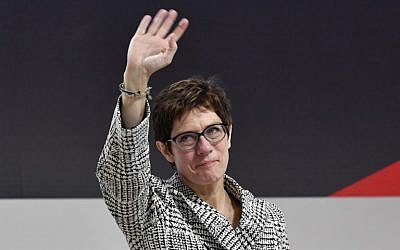 Germany's conservative Christian Democratic Union (CDU) party's Secretary General Annegret Kramp-Karrenbauer waves on stage after she was elected as party's leader during the CDU congress on December 7, 2018 at a fair hall in Hamburg, northern Germany. (John MacDougall/AFP)
