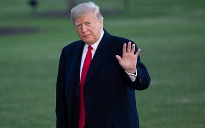 US President Donald Trump walks from Marine One after arriving on the South Lawn of the White House in Washington, DC, December 7, 2018, following a day trip to Kansas City, Missouri. (SAUL LOEB / AFP)
