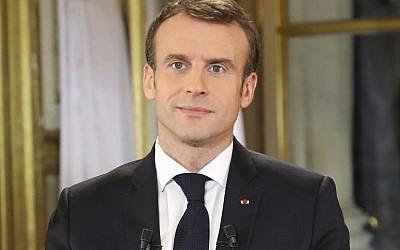 French President Emmanuel Macron speaks during a special address to the nation, his first public comments after four weeks of nationwide 'yellow vest' protests, on December 10, 2018, at the Elysee Palace, in Paris. (LUDOVIC MARIN / POOL / AFP)