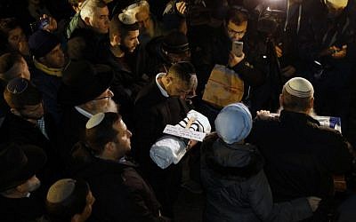 Relatives of Amichai and Shira Ish-Ran attend the funeral of their baby, who was born prematurely after his mother was wounded in a terror attack outside the West Bank settlement of Ofra, at Mount of Olives ceremony in Jerusalem on December 12, 2018. (AFP)