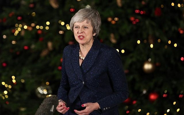 Britain's Prime Minister Theresa May makes a statement outside 10 Downing Street in central London after winning a confidence vote on December 12, 2018. (Daniel Leal-Olivas/AFP) Britain's Prime Minister Theresa May makes a statement outside 10 Downing Street in central London after winning a confidence vote on December 12, 2018. (Daniel Leal-Olivas/AFP)