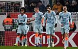 Chelsea's Brazilian midfielder Willian (L) is congratulated by teammates Ross Barkley, Álvaro Morata and Davide Zappacosta (R) after scoring during a UEFA Europa League Group soccer match between MOL Vidi FC and Chelsea on December 13, 2018, in Budapest, Hungary. (Attila Kisbenedek/AFP)