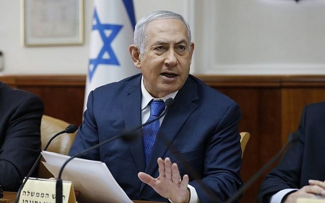 Prime Minister Benjamin Netanyahu at the weekly cabinet meeting at the Prime Minister's Office in Jerusalem on December 16, 2018. (Abir Sultan/Pool/AFP) Prime Minister Benjamin Netanyahu at the weekly cabinet meeting at the Prime Minister's Office in Jerusalem on December 16, 2018. (Abir Sultan/Pool/AFP)